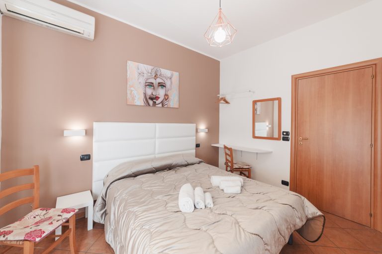Double bedroom with warm tones